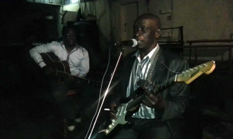 Ochieng Nelly playing with jazz guitarist Eddie Grey