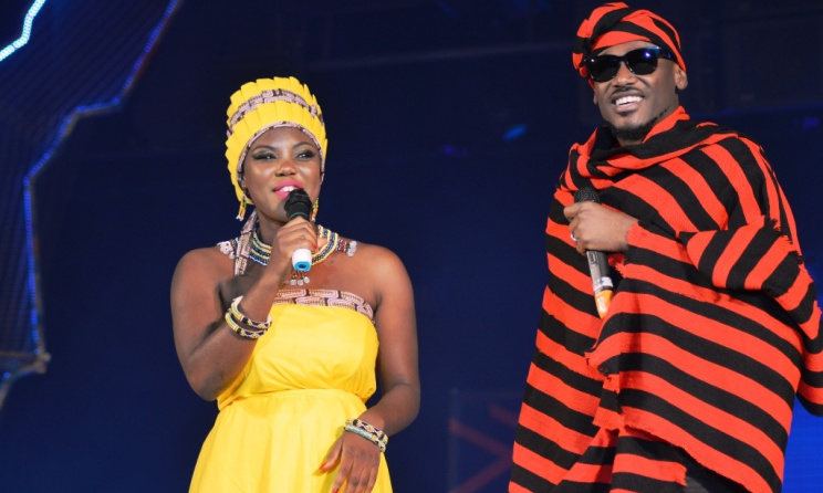 Show hosts Marisse Akotie and 2face.