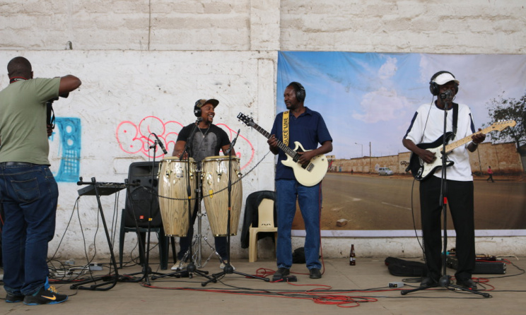 Idd Aziz, David 'Mobb' Otieno and John Nzenze performing