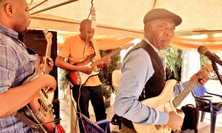 76 year-old Guitar veteran Isaac Onote and other members of the Mayors Band