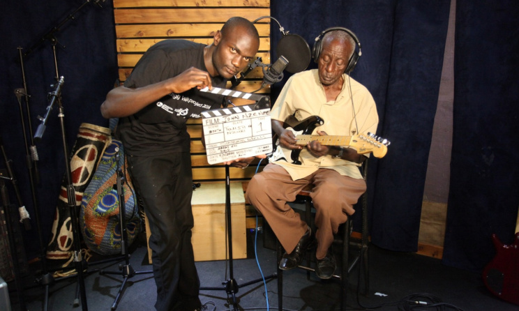 John Nzenze during a recording session. Photo: www.singingwells.org