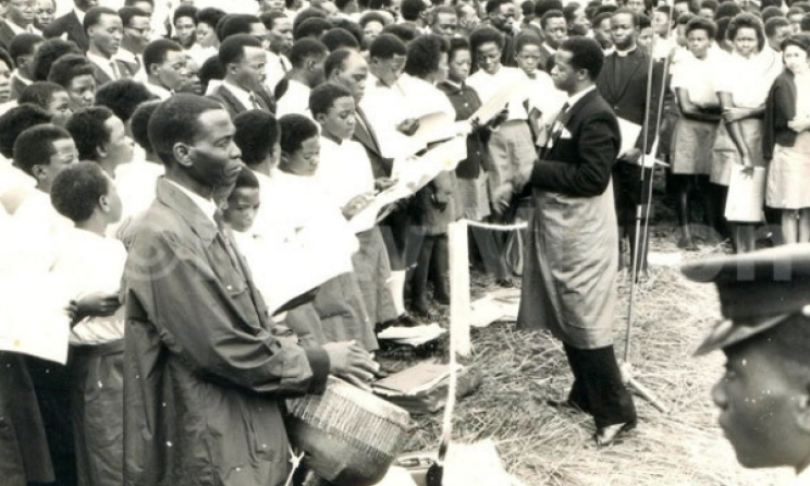 Joseph Kyagambiddwa conducting a choir at Namugongo in the 1960s. Photo: www.newvision.co.ug 