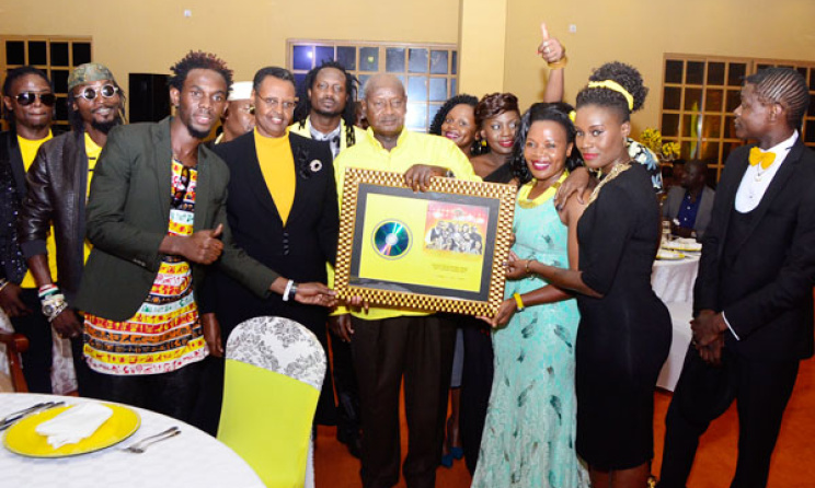 Ugandan artists with President Museveni. Photo: www.chano8.com