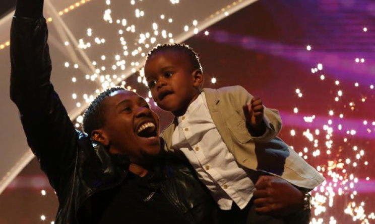 Last year's winner of SA's Got Talent, DJ Arch Jnr. with his proud father. Photo: etv.co.za