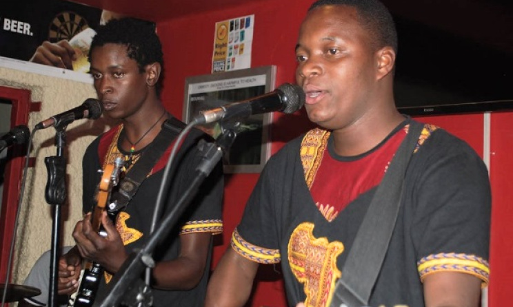 Yulesis Katoto (right) and Deep Roots performing in Gweru. Photo: Innocent Tinashe Mutero
