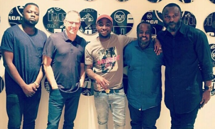 Davido, middle, with David Edge of RCA, second left. Photo: Instagram