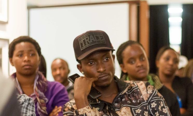 Audience members listen to a discussion on Kenyan music. Photo: Julian Manjahi