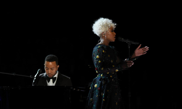 Erivo performing with John Legend at the 2017 Grammys. Photo: Slate