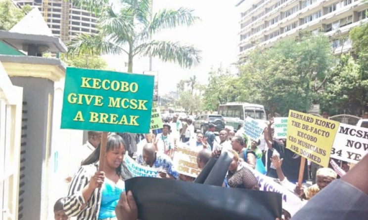 Demonstrators claiming to be artists took to the streets last week in support of embattled MCSK.