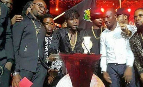 Stonebwoy accepts one of his three awards. Photo: Facebook