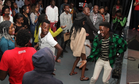 Fans dance at the concert. Photo by Edwin Machuka