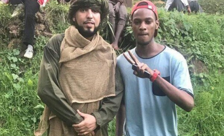 French Montana with a crew member on set in Uganda. Photo: Arnold Jethro/Facebook