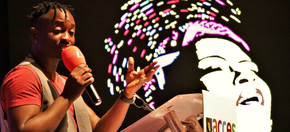 Eric Wainaina delivering ACCES 2018 keynote